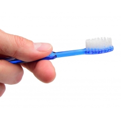 Jednorazowe szczoteczki do zębów ze szczególnie miękkim włosiem, nasączone pastą do zębów.